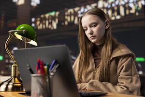 University student engrossed in research on foreign affairs via primary source materials and academic resources to create a perfect assignment. Girl working hard for a scholarship and certificate. photo