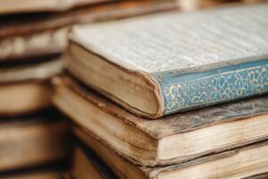 Stack of Vintage Books with Ornate Covers and Aged Pages photo