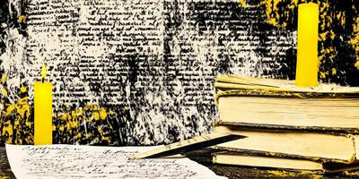 Vintage Writing Setup with Books, Candles, and Quill in Artistic Black and Yellow Tone photo