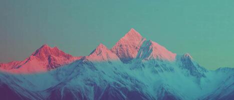 Majestic Himalayan mountains with snow capped peaks at dawn photo