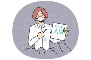 Woman suffers from air pollution and shows paper with text fresh air stands in protective mask vector