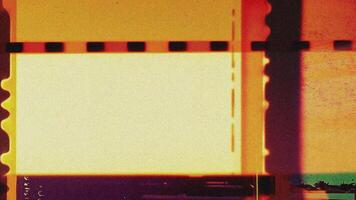 old film frames in fast stop motion animation with cinematic colors for dynamic overlay effect and transitions, red and yellow film frames with grain and noise video