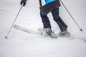 Close-Up of the skier in Action photo