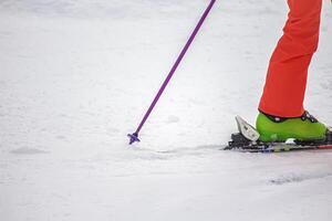 Close-Up of Skier in Action on the snow photo