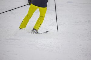 View of the skier in action on the snow photo