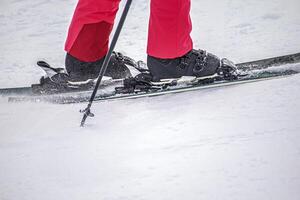 A person on the ski on the mountain slope photo