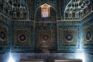 Samarkand, Uzbekistan-august 13, 2023-Inside of Shakhi Zinda necropolis, a famous mausoleum complex in Samarkand during a sunny day photo