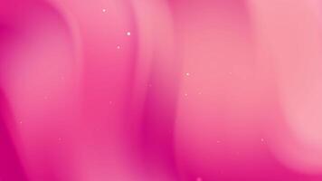Pink gradient background features subtle glowing particles. video