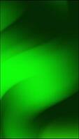 a green abstrak background with a wave pattern video