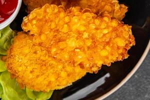 Chicken nuggets in breaded deep fried fresh tasty food dish delicious gourmet food background on the table copy space photo