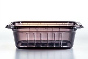 Empty rectangular plastic food container with lid on white background photo