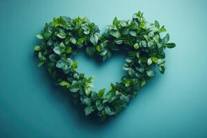 Heart shape from green leaves symbolizing love for nature and ecology photo