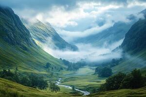 Breathtaking glen coe valley in scotland is shining through fog and mist photo