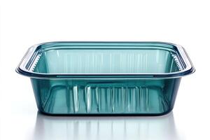 Empty green plastic food container on white background photo