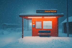 Empty bus stop covered in snow during a blizzard at night photo