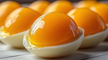 Golden yolks glisten on a rustic wooden board in a lovely culinary display photo
