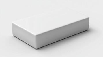 A plain white block sits quietly on a sleek surface, reflecting subtle ambient light photo