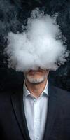 Businessman obscured by a large cloud of vapor, conceptual image of mystery and concealment photo