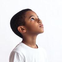 A young boy looking up at something photo