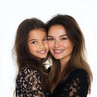 A woman and her daughter posing for a photo