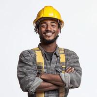 A smiling black man in a hard hat photo