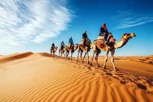 Camel Caravan Crossing the Sahara Desert photo