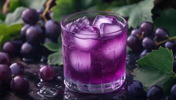Grape Juice with Ice Cubes and Grapes photo