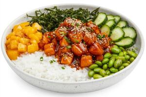 Enjoying a vibrant poke bowl featuring fresh ingredients like marinated fish, mango, cucumber, and edamame, presented beautifully on a white background photo