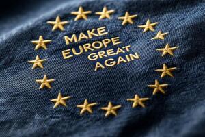 Slogan highlighting the call to make Europe great, featured prominently within a circle of European stars, symbolizing unity and purpose in a contemporary context photo