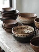 Ceramic bowl with decorations sitting on burlap surface photo