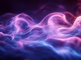 Colorful swirling smoke creating abstract shapes on blue and purple background photo
