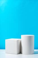 Two geometric shapes on display against a bright blue background in a modern setting photo