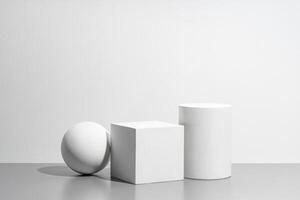 Abstract composition featuring three white geometric shapes in a minimalist interior setting photo
