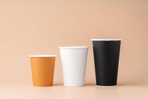 Paper cups stacked on a neutral background for a visually appealing display photo