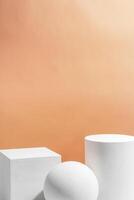 White geometric shapes arranged stylishly on a soft peach background in a minimalist setting photo