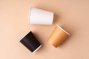 Paper cups stacked on a neutral background for a visually appealing display photo