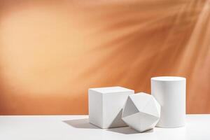 White geometric shapes arranged stylishly on a soft peach background in a minimalist setting photo