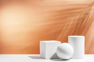 White geometric shapes arranged stylishly on a soft peach background in a minimalist setting photo