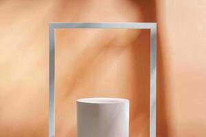 Minimalistic display of a white cylindrical object framed by a white rectangular border against a soft orange background photo