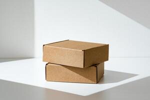 Freshly packed cardboard boxes resting on a white surface, illuminated by soft natural light photo