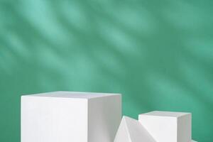 Simple geometric shapes on a green background with soft lighting photo