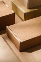 Multiple cardboard boxes arranged on a surface for packaging and shipping in a warehouse setting photo