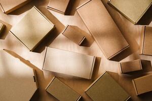 Multiple cardboard boxes arranged on a surface for packaging and shipping in a warehouse setting photo