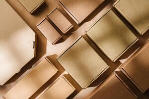 Multiple cardboard boxes arranged on a surface for packaging and shipping in a warehouse setting photo