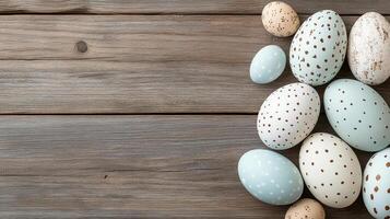 Beautifully decorated Easter eggs on rustic wooden background photo