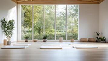 serene yoga studio with natural light and peaceful greenery outside photo