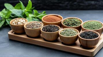vibrant selection of herbal teas in wooden bowls, showcasing diverse flavors photo