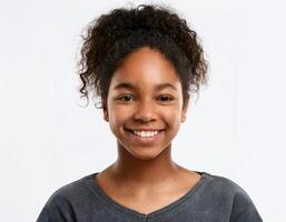 Portrait of African Teenager with Defined Defined Textured Ringlets and Expression on White Background photo