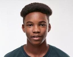 Studio Portrait of African Teenager with Defined Defined Defined Curly Curls on White Background photo