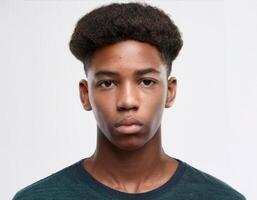 Close Up Portrait of African Teenager with Defined Defined Defined High Curly Curls on White Background photo